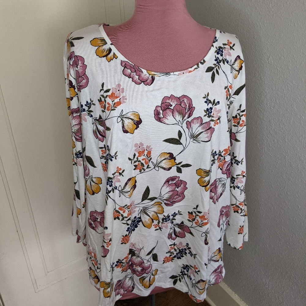 Tunic length long sleeve floral top